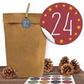 "25 Kraftpapiertüten mit 24 Adventsaufklebern".