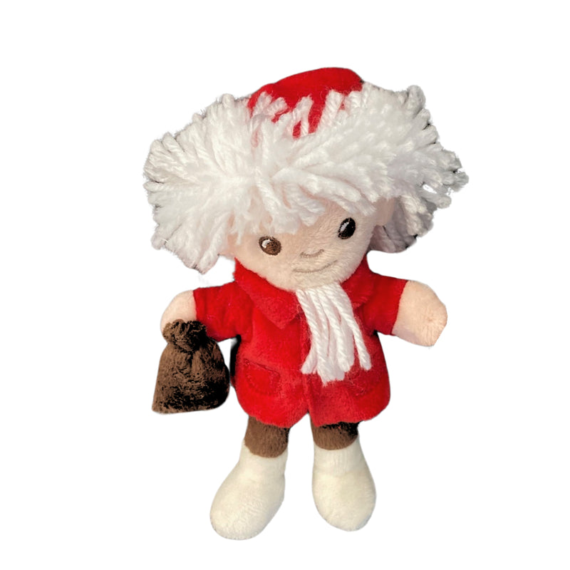 Sandmannpuppe mit rotem Mantel und Schlafsandsäckchen